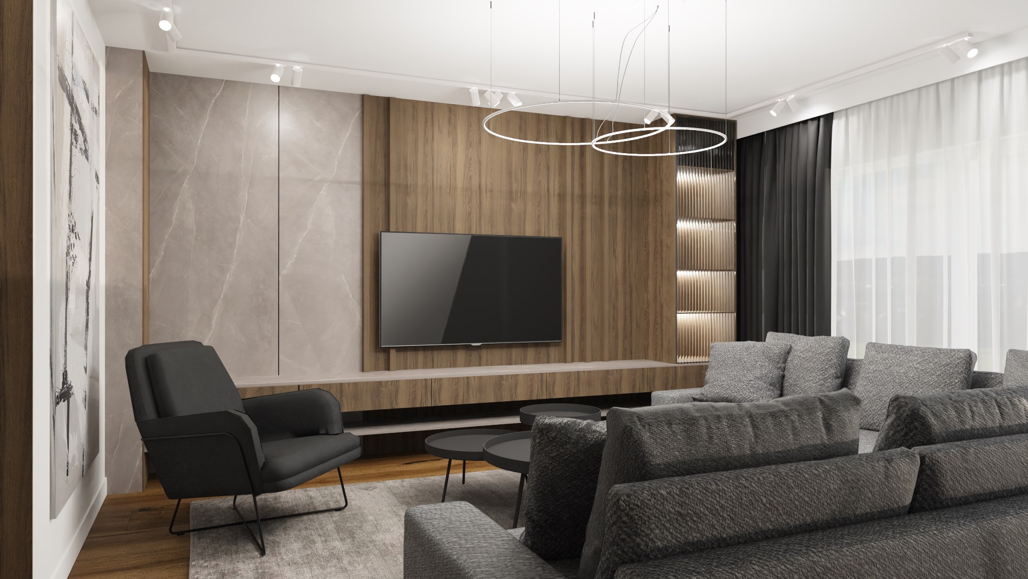 Nowoczesny salon z szarą sofą, czarnym fotelem, telewizorem na drewnianej ścianie i okrągłymi lampami sufitowymi.