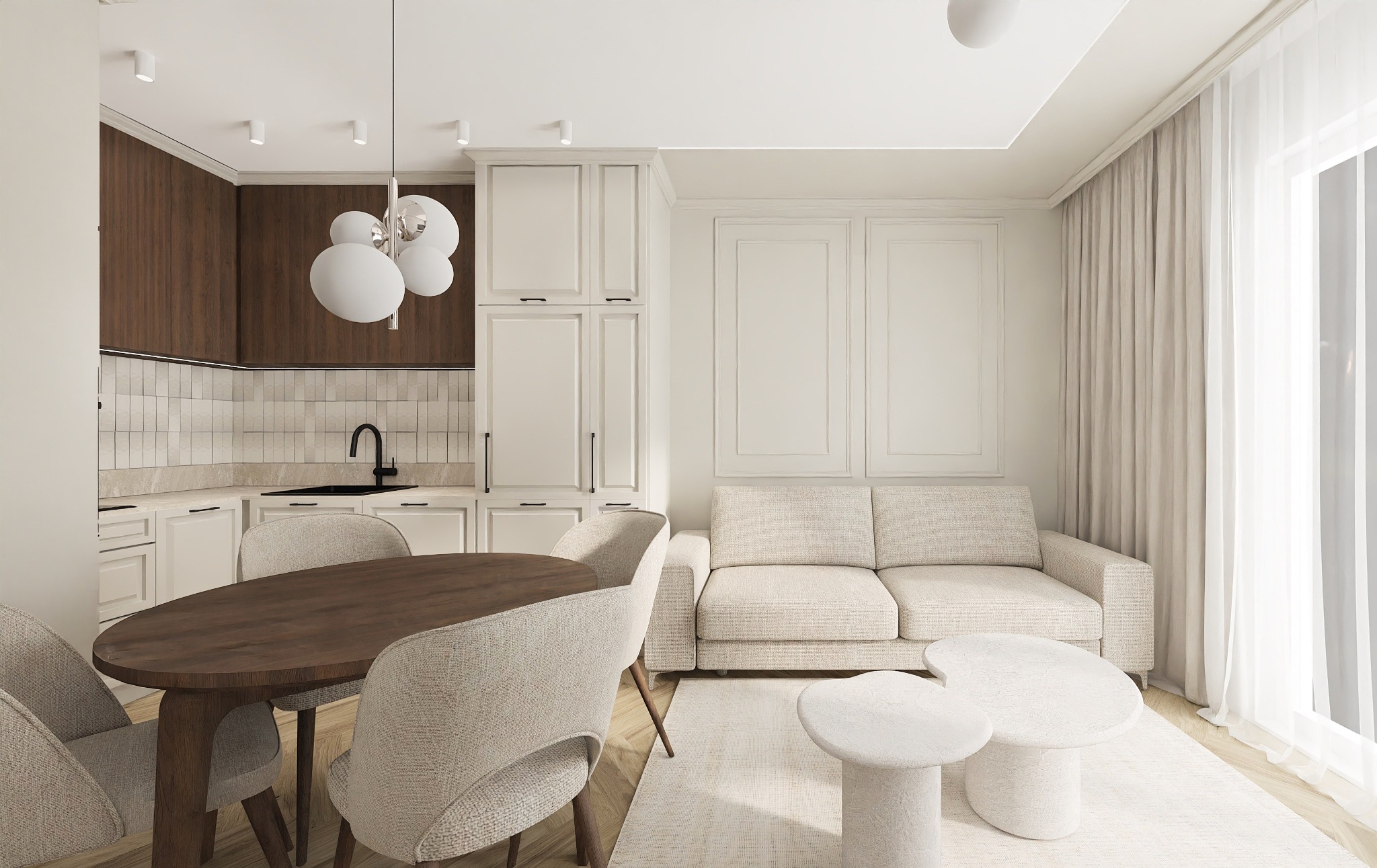 Jasne wnętrze: salon z aneksem kuchennym. Drewniany stół, beżowa sofa, białe szafki kuchenne i dekoracyjne panele ścienne. Minimalistyczny design, naturalne światło.