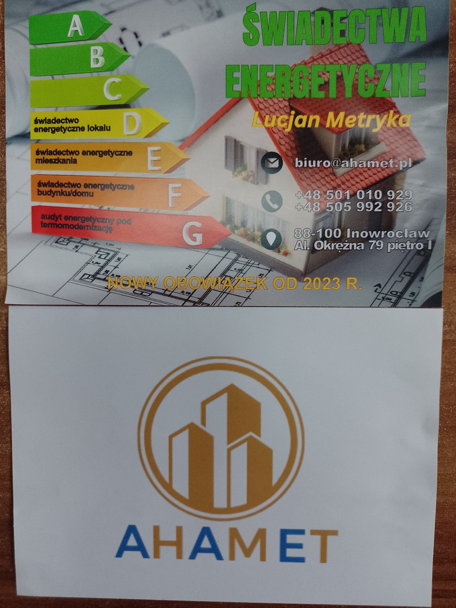 Ulotka reklamowa z informacjami o świadectwach energetycznych, w tym oceny energetyczne od A do G, dane kontaktowe firmy Lucjan Metryka oraz logo firmy AHAMET.