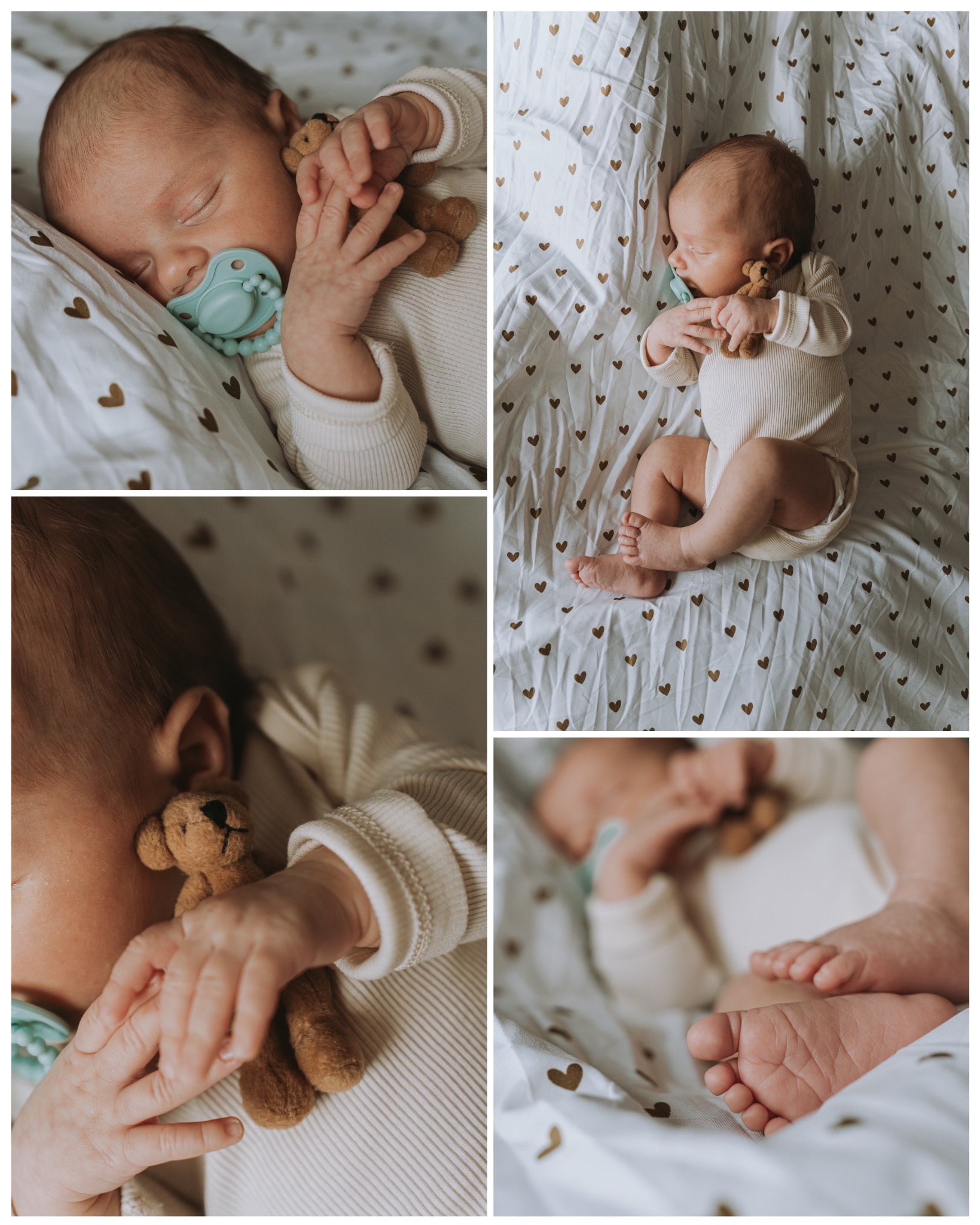 Noworodek śpiący na białej pościeli w złote serduszka, z turkusowym smoczkiem i pluszowym misiem w dłoni