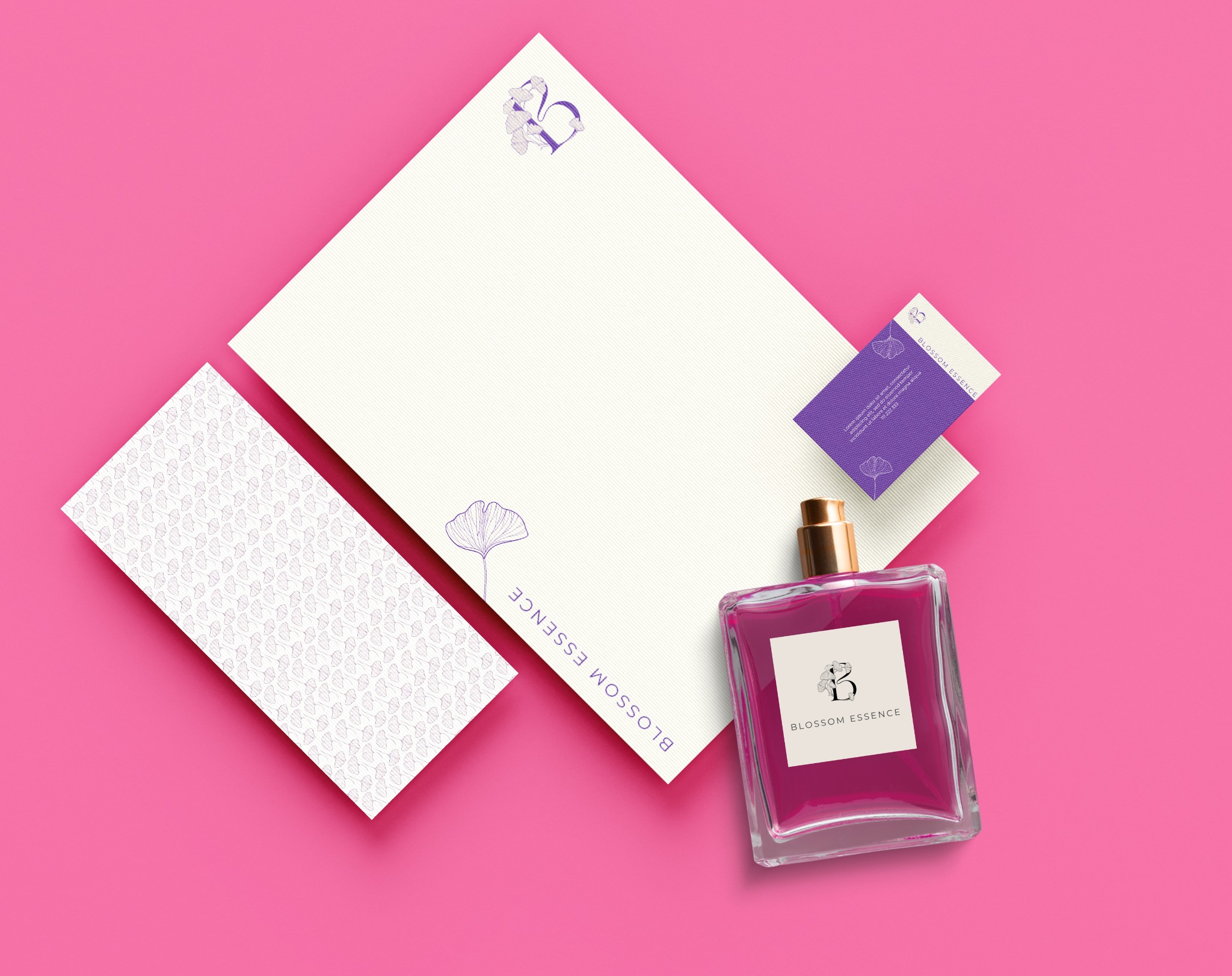 Identyfikacja wizualna marki Blossom Essence: flakon perfum, wizytówka, papier firmowy i kartka z motywem liści miłorzębu na różowym tle.