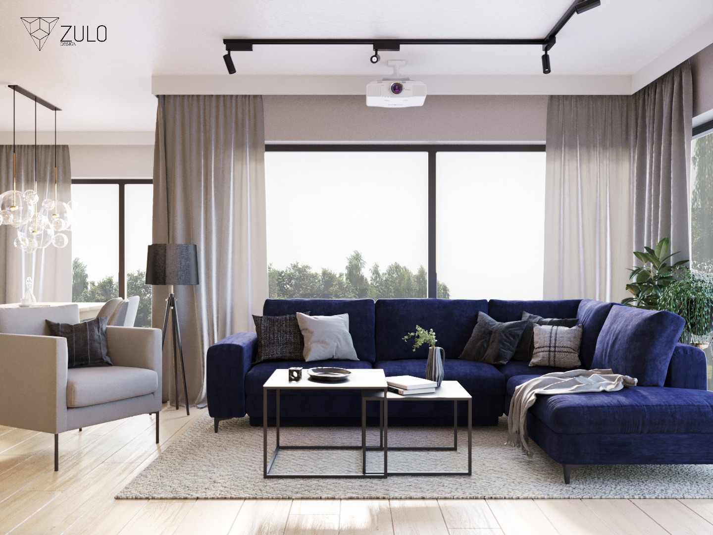 Elegancki salon z granatową sofą narożną, szarym fotelem, stolikami kawowymi z marmurowym blatem i projektorem na suficie.