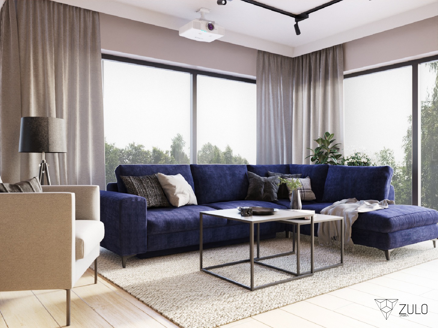 Nowoczesny salon z granatową sofą modułową, beżowym fotelem, stolikami kawowymi z metalowymi nogami i projektorem sufitowym