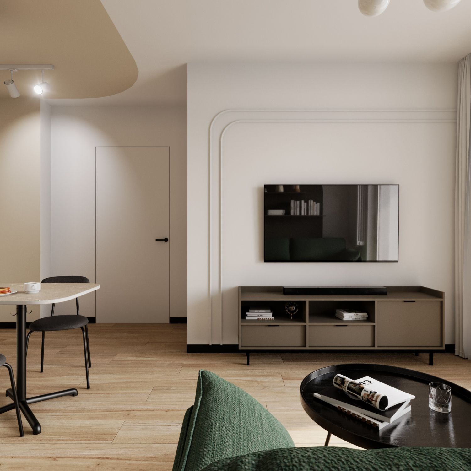 Jasne wnętrze mieszkania w neutralnych barwach z akcentami zieleni: stół z czarnymi krzesłami, szafka RTV pod telewizorem i okrągły stolik kawowy z magazynem i szklanką. Na ścianie dekoracyjne...