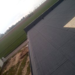 Zaklad Blacharsko-Dekarski - Układanie styropapy i papy