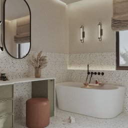 Prosvero Studio Aranżacji Wnętrz - Nowoczesna łazienka w neutralnych barwach z wanną, toaletką z lustrem i okrągłym pufem. Ściany i podłoga wykończone w stylu lastryko.