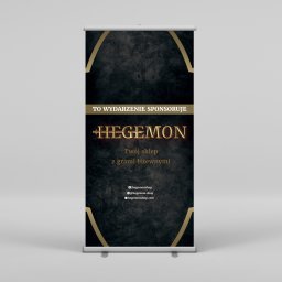 Agencja Interaktywna Digitly - Roll-up reklamowy z logo Hegemon, czarne tło z teksturą, złote elementy graficzne i informacje kontaktowe.