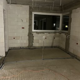 Wykonanie oświetlenia zasilenie gniazdek i wyspy w kuchni według projektu. 