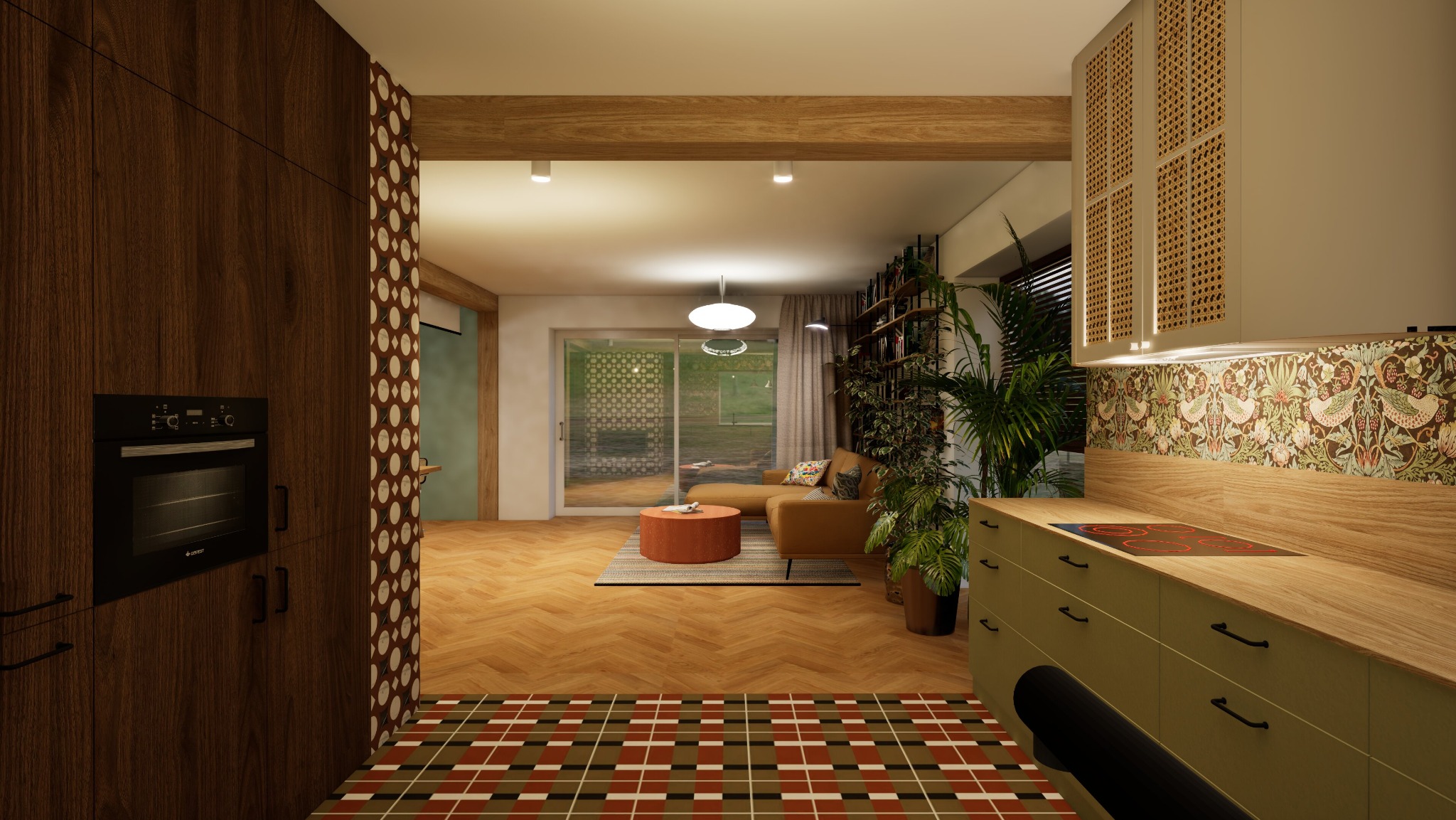 Wnętrze mieszkania z otwartą kuchnią i salonem, widok na zabudowę kuchenną z zielonymi szafkami, drewnianym blatem i wzorzystą tapetą nad blatem, w tle salon z beżową sofą i roślinami.