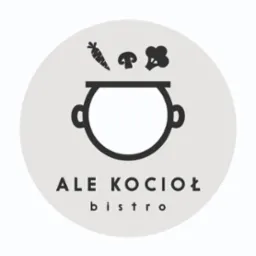 Grafika przedstawia logo bistro 'ALE KOCIOŁ' z motywem gotującego się garnka, z którego unoszą się sylwetki warzyw: marchewki, pieczarki i brokuła.