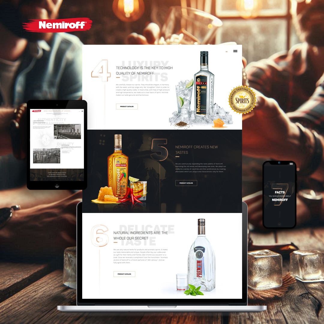 Ekran laptopa, tabletu i smartfona prezentujące stronę internetową marki wódki Nemiroff, z widocznymi butelkami wódki i elementami graficznymi strony.