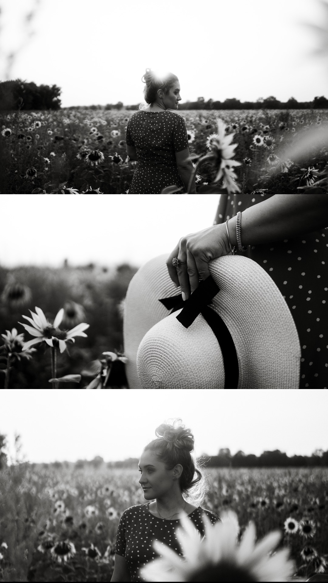 Czarno-białe ujęcie kobiety w sukience w grochy na polu słoneczników, trzymającej słomkowy kapelusz z czarną wstążką.