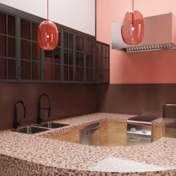 ANETA WIELGOSZ ARTENEUM PRACOWNIA ARCHITEKTONICZNA - Nowoczesna kuchnia w odcieniach brązu i różu. Blat z terazzo, czarne szafki z przeszkleniami i wiszące lampy o nietypowym kształcie. Minimalistyczny design.