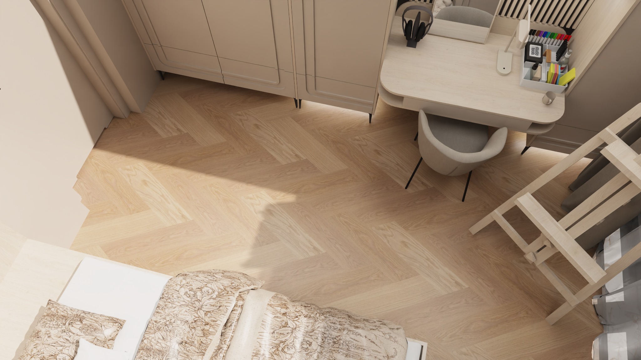 Widok z góry na jasny pokój dziecięcy z biurkiem, łóżkiem i szafą w odcieniach beżu. Parkiet ułożony w jodełkę. Minimalistyczny design z akcentami w postaci akcesoriów na biurku.