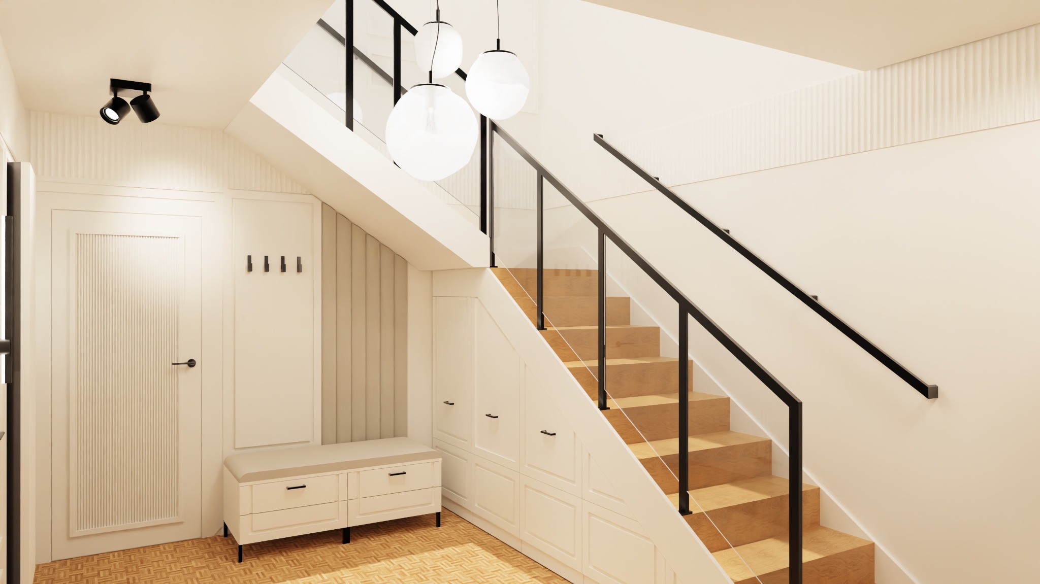 Jasne wnętrze z drewnianymi schodami i szklaną balustradą. Białe ściany z panelami, oświetlenie punktowe i wiszące lampy kuliste. W tle drzwi i siedzisko z wieszakami.
