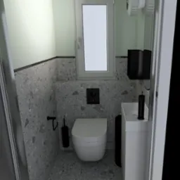 Nowoczesna łazienka z szarymi ścianami w plamki, białą toaletą i umywalką na szafce, czarne akcenty: dozownik mydła, uchwyt na papier toaletowy i szczotka do WC.