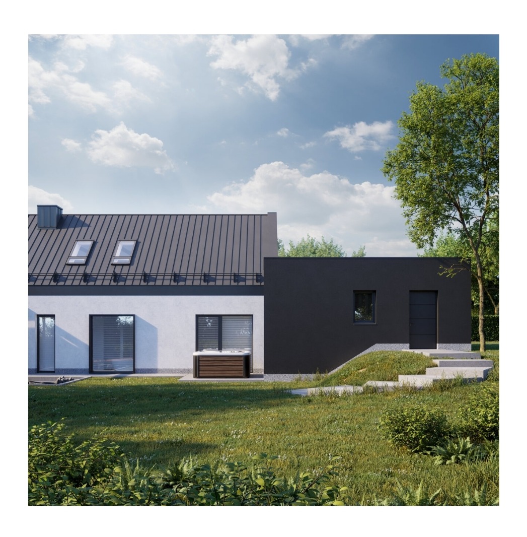 Nowoczesny dom z szarą blachą na dachu, białą fasadą i czarną dobudówką. Widoczny trawnik, drzewo i jacuzzi przy ścianie budynku. Słoneczny dzień.