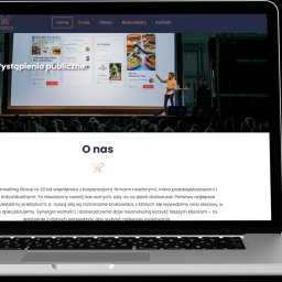 Adwebs Solutions Adam Maruszak - Laptop i smartfon wyświetlające stronę internetową firmy Anizeet, prezentującą relację z publicznego wystąpienia i ofertę dla restauracji.