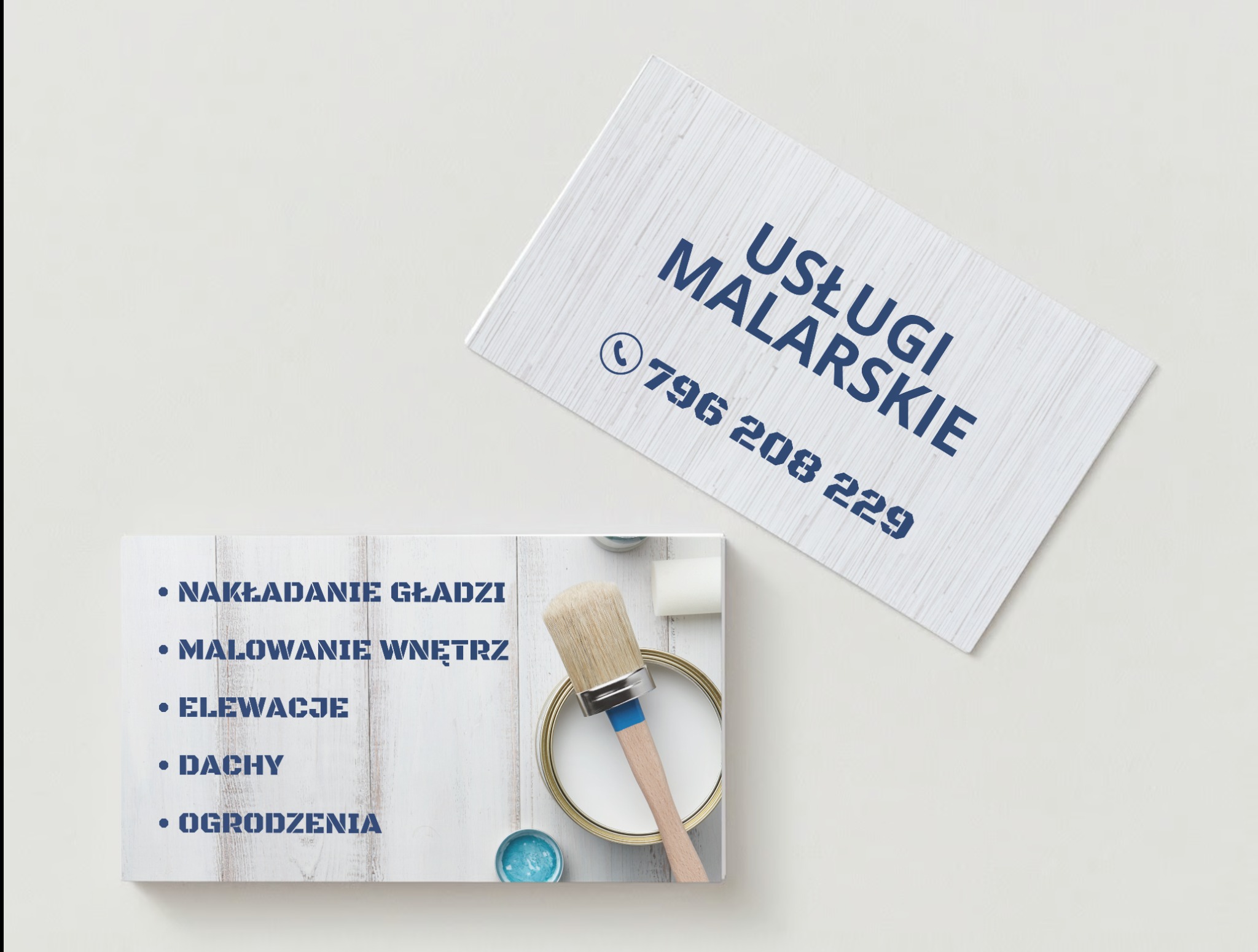 Dwie wizytówki firmy malarskiej na białym tle. Jedna wizytówka zawiera dane kontaktowe i napis 'USŁUGI MALARSKIE' w kolorze niebieskim. Druga wizytówka zawiera listę usług, takich jak nakładanie...