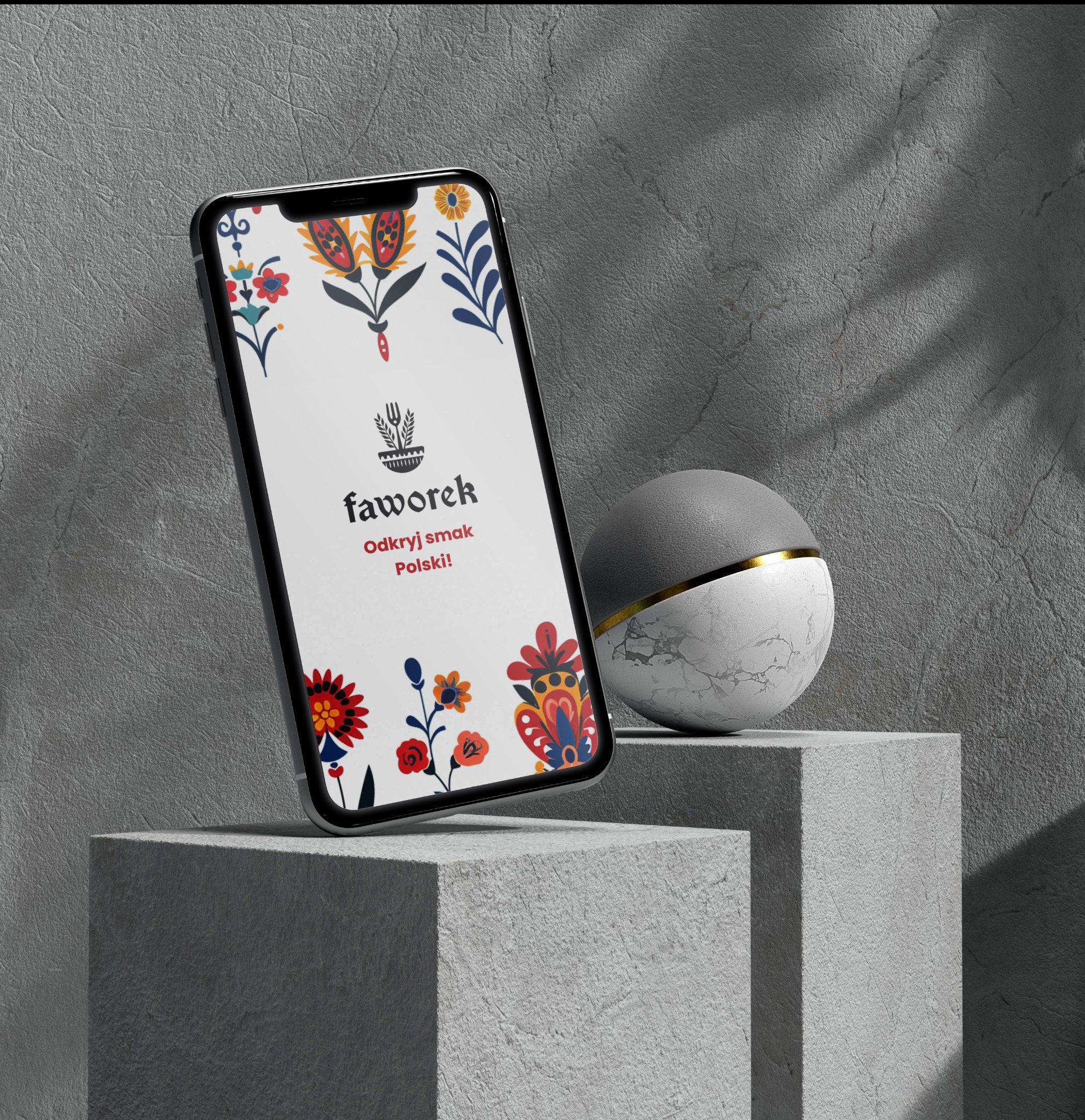 Mockup telefonu prezentujący logo i identyfikację wizualną firmy 'faworek' z motywami kwiatowymi w stylu ludowym, na tle betonowych bloków i dekoracyjnej kuli.
