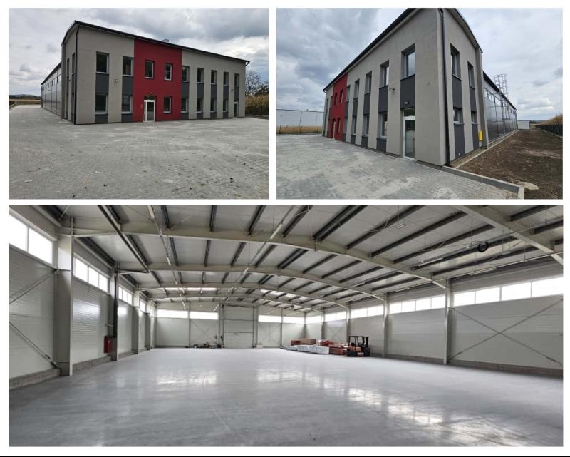 Nowoczesny budynek przemysłowy z elementami czerwieni i szarości, widok z zewnątrz i wnętrza hali z betonową posadzką, w tle widoczny wózek widłowy.