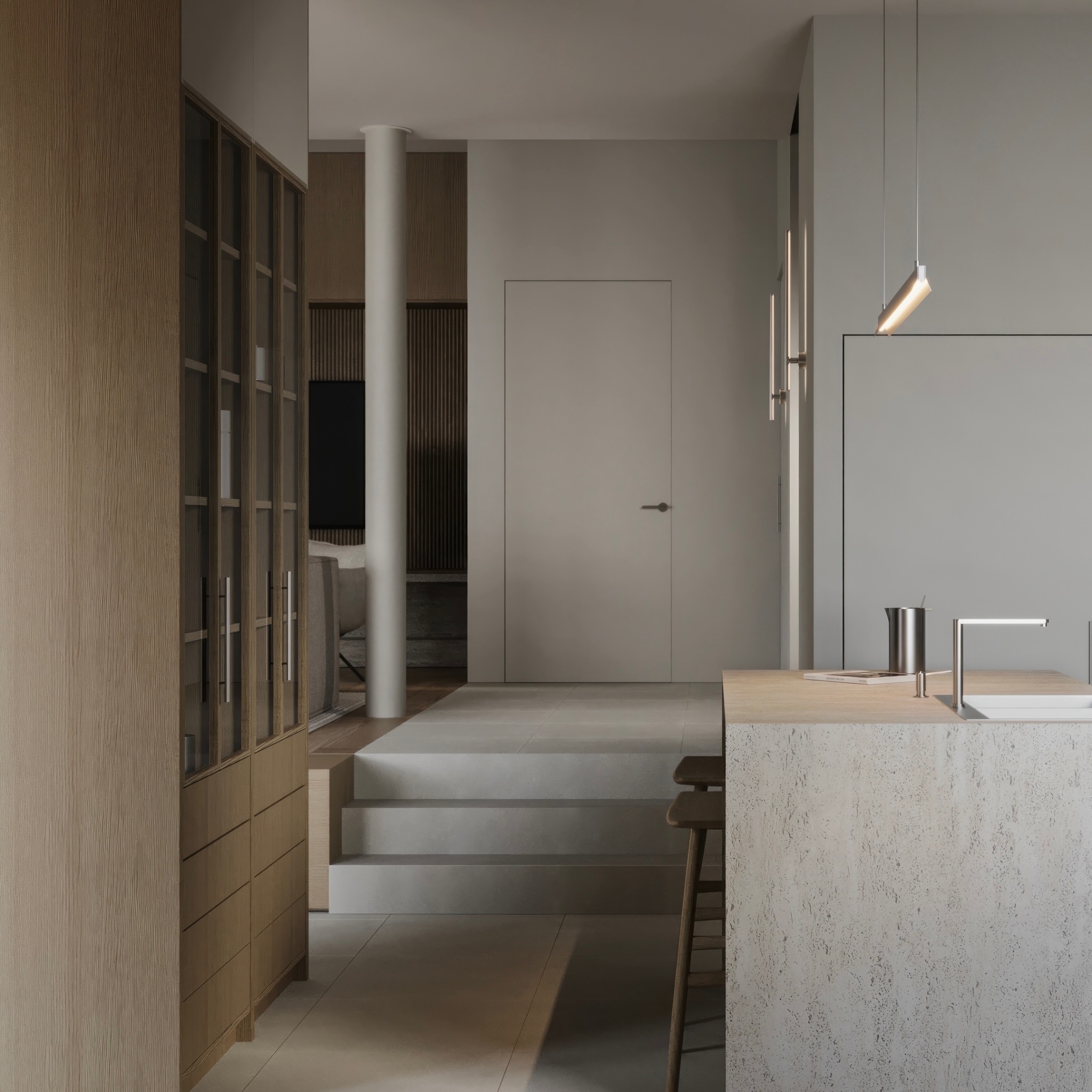 Nowoczesne wnętrze: drewniana zabudowa, wyspa kuchenna z blatem z jasnego drewna, minimalistyczne oświetlenie, schody prowadzące do salonu z kolumną.