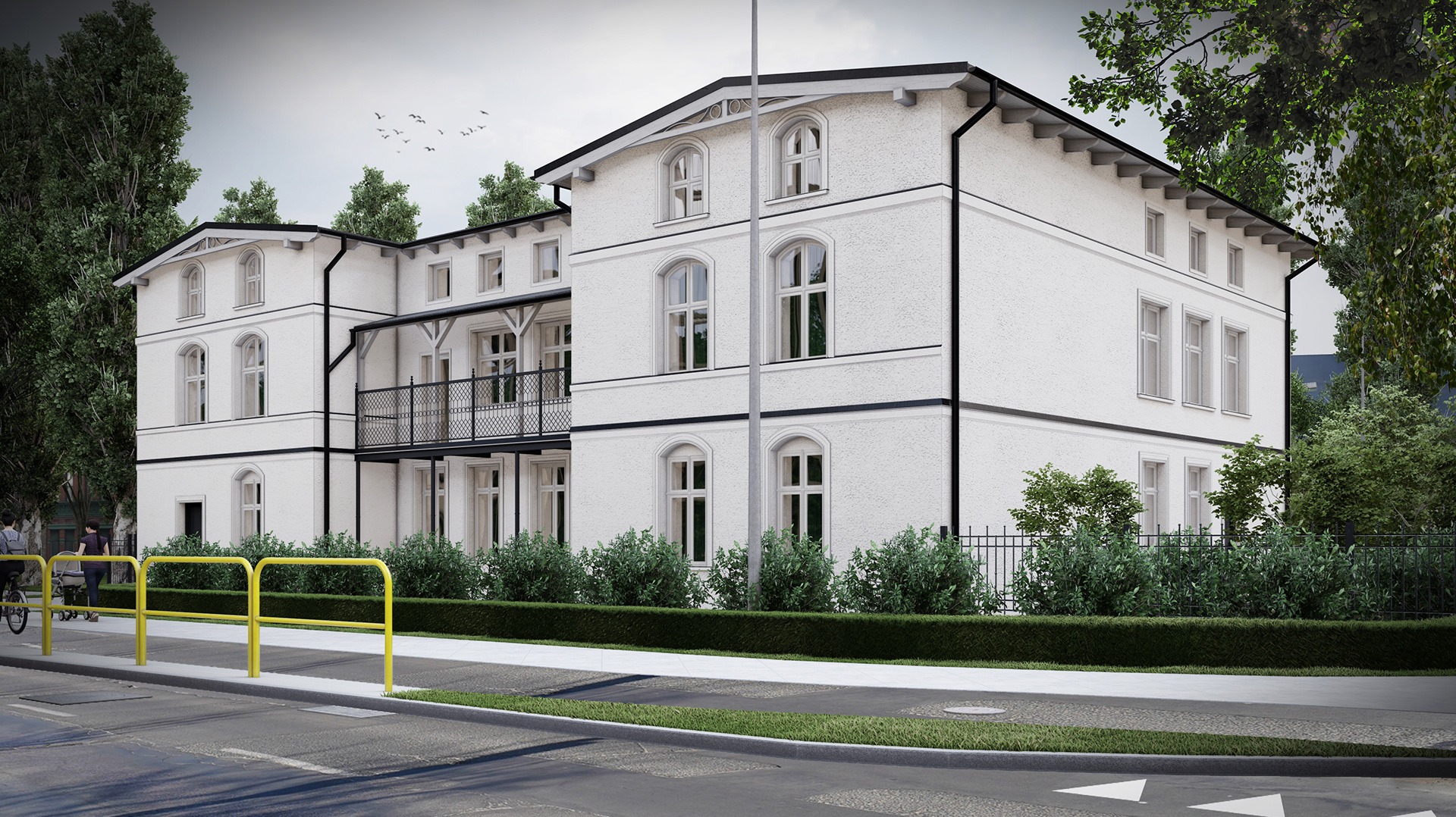 Wizualizacja dwukondygnacyjnego budynku z białymi ścianami i czarnym dachem, z balkonem z czarną balustradą, widoczna z perspektywy ulicy z żółtymi barierkami ochronnymi.