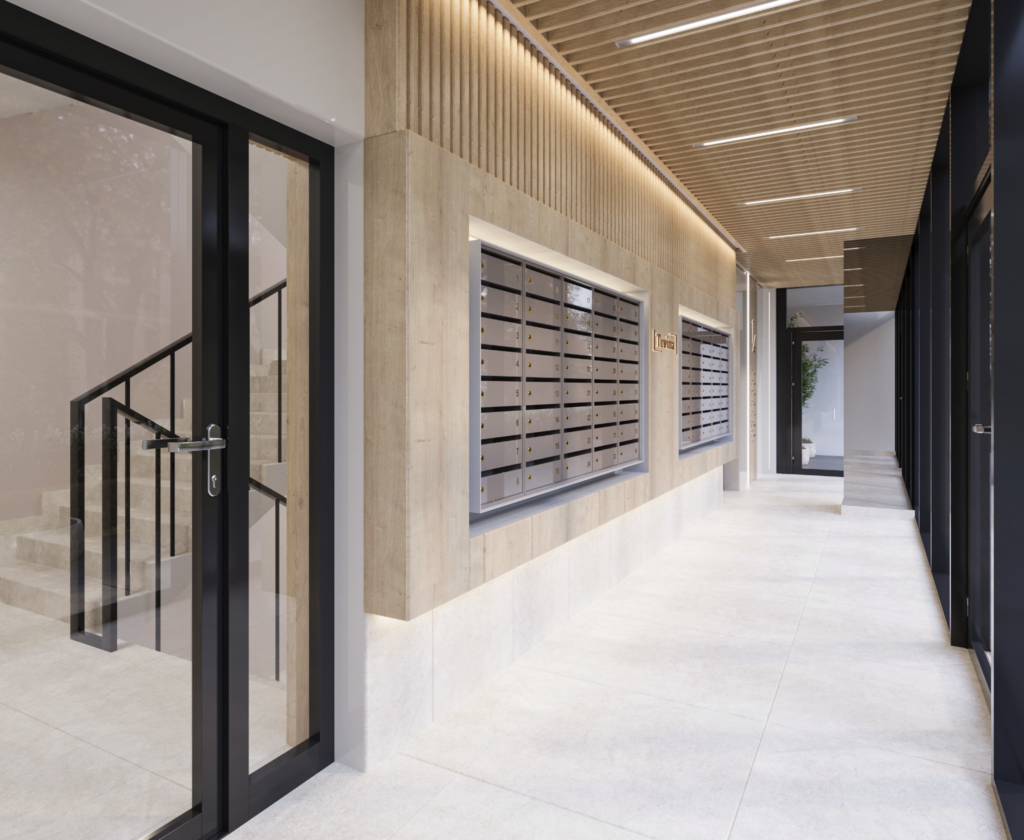 Korytarz z drewnianą boazerią i skrzynkami pocztowymi w nowoczesnym budynku w Łodzi. Widoczne schody i drzwi z czarnymi ramami.
