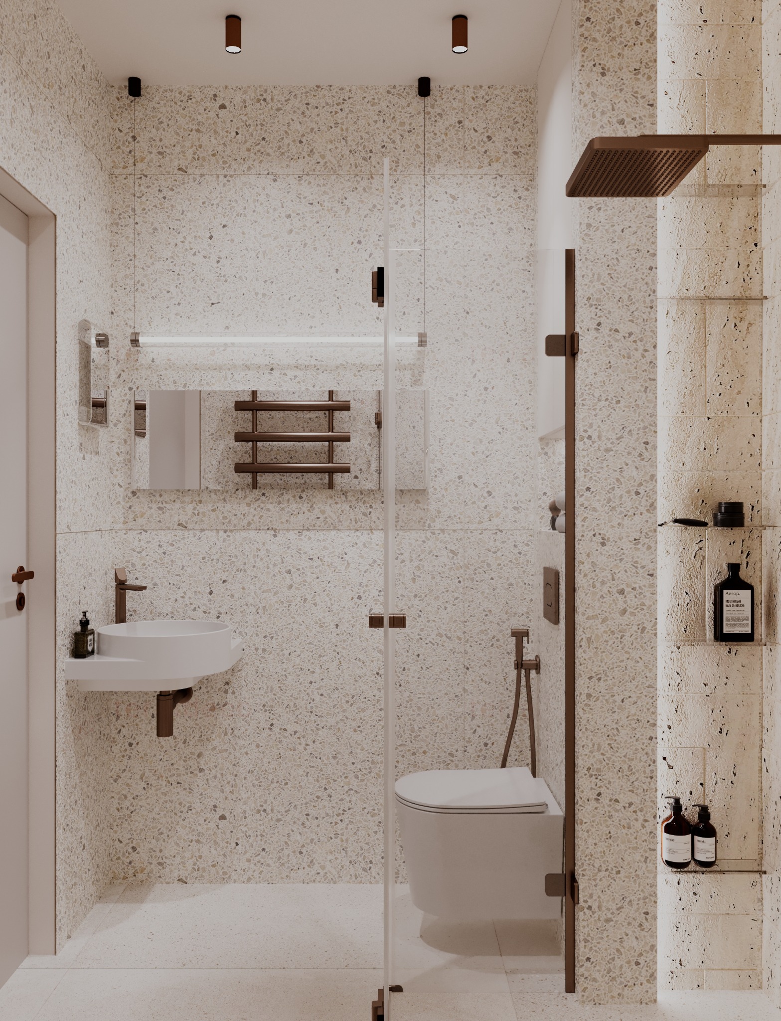 Nowoczesna łazienka z kabiną prysznicową typu walk-in, umywalką na blacie i toaletą podwieszaną. Beżowe płytki imitujące lastryko na ścianach i podłodze.