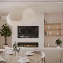 Jasne, przestronne wnętrze salonu z jadalnią, okrągły stół nakryty do posiłku, trzy papierowe lampy wiszące, telewizor nad kominkiem, półki z dekoracjami i roślinami, minimalistyczny design.