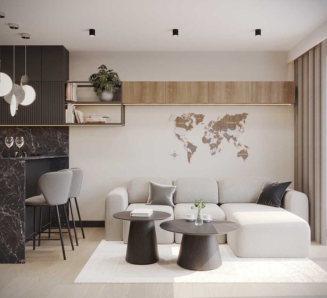 Jasny salon z narożną sofą, drewnianą mapą świata na ścianie, marmurowym barkiem i okrągłymi stolikami kawowymi na kremowym dywanie.