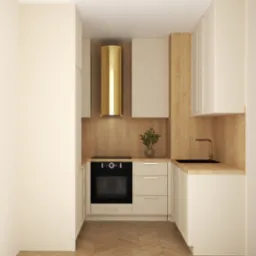 Kompaktowa kuchnia w odcieniach beżu i drewna, z akcentem w postaci złotej, cylindrycznej okapu i minimalistyczną armaturą.