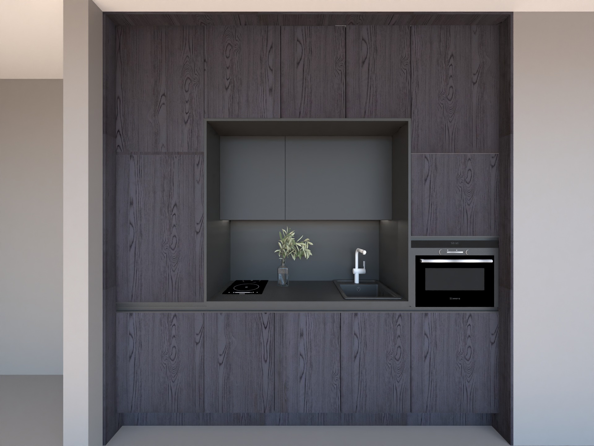 Kompaktowa kuchnia w odcieniach szarości z frontami szafek imitującymi ciemne drewno, wyposażona w płytę indukcyjną, zlewozmywak z baterią oraz piekarnik marki Siemens.