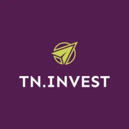 Logo firmy TN.INVEST na fioletowym tle, przedstawiające stylizowany papierowy samolot w okręgu.