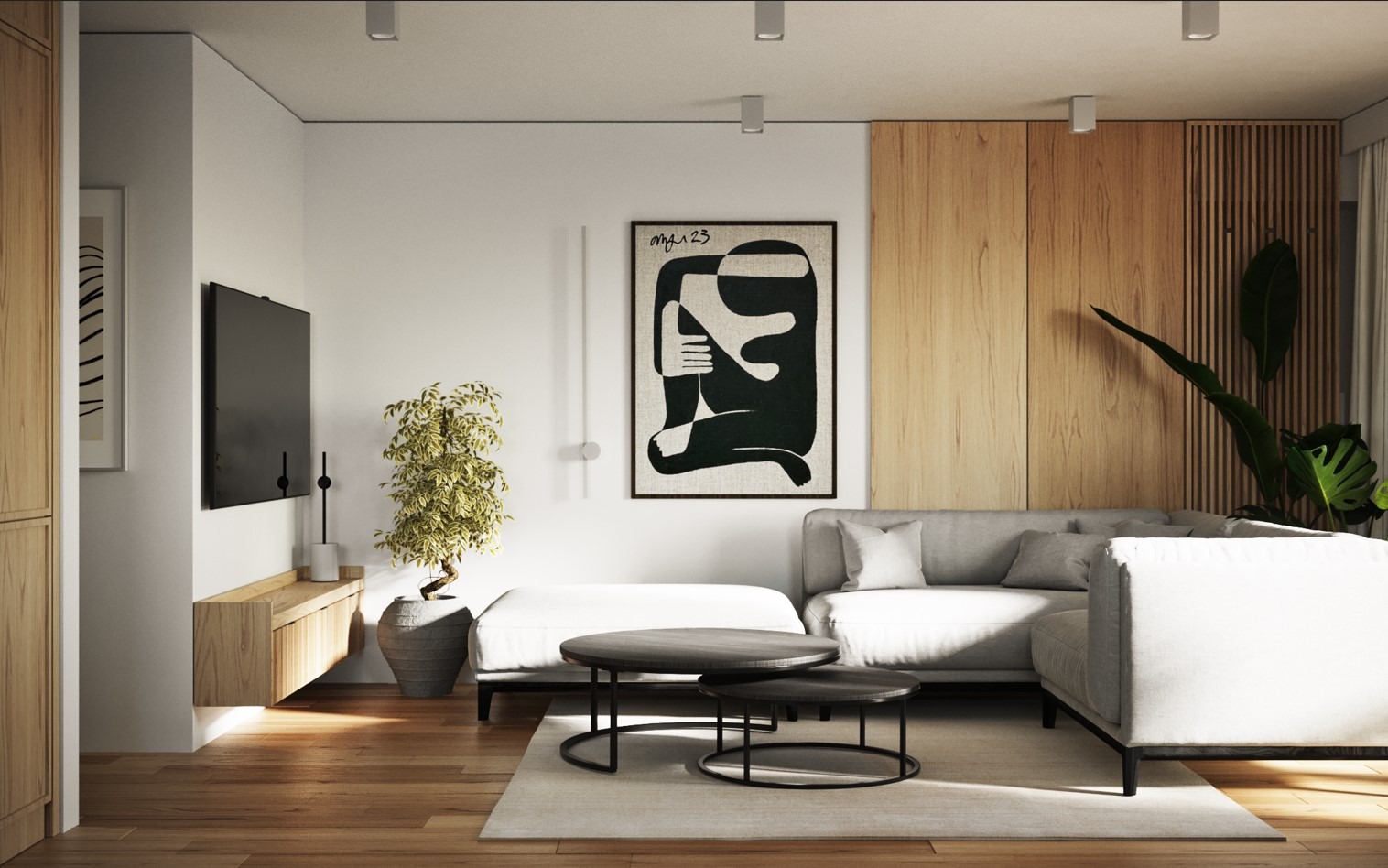 Jasne wnętrze salonu w Krakowie z drewnianą podłogą, szarą sofą narożną, okrągłymi stolikami kawowymi i abstrakcyjnym obrazem na ścianie.