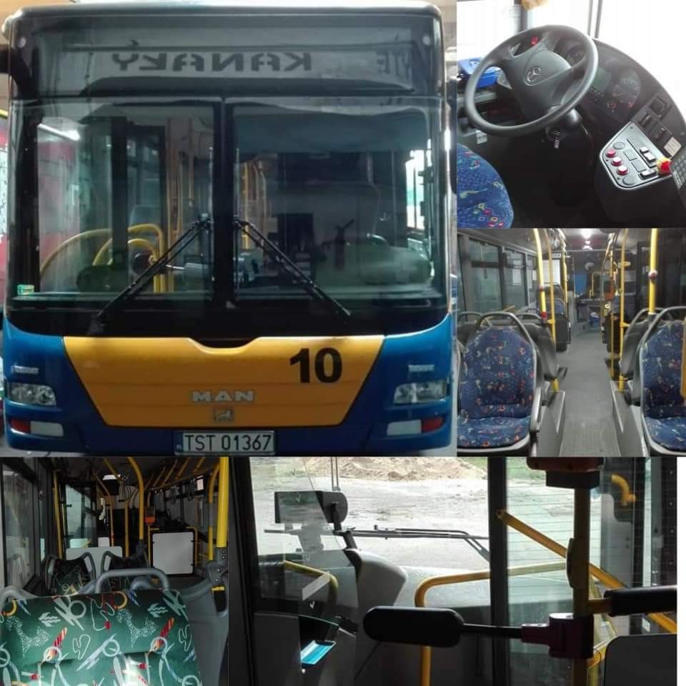 Wnętrze i przód autobusu miejskiego MAN z numerem bocznym 10, widok na kierownicę, siedzenia z różnymi wzorami tapicerki, tablica rejestracyjna TST 01367.