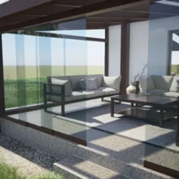 Nowoczesna aranżacja przeszklonej werandy z szarymi sofami i stolikiem kawowym na tle zielonego ogrodu. Minimalistyczny design, naturalne światło, spokojna atmosfera.