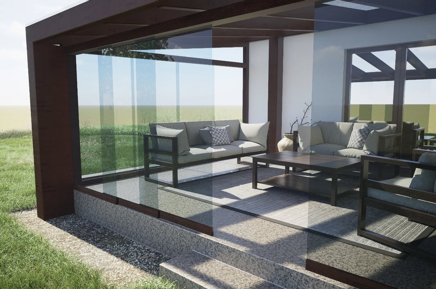 Nowoczesna aranżacja przeszklonej werandy z szarymi sofami i stolikiem kawowym na tle zielonego ogrodu. Minimalistyczny design, naturalne światło, spokojna atmosfera.