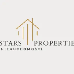 Logo firmy Stars Properties Nieruchomości z minimalistycznym symbolem domu w kolorze złotym na jasnym tle.