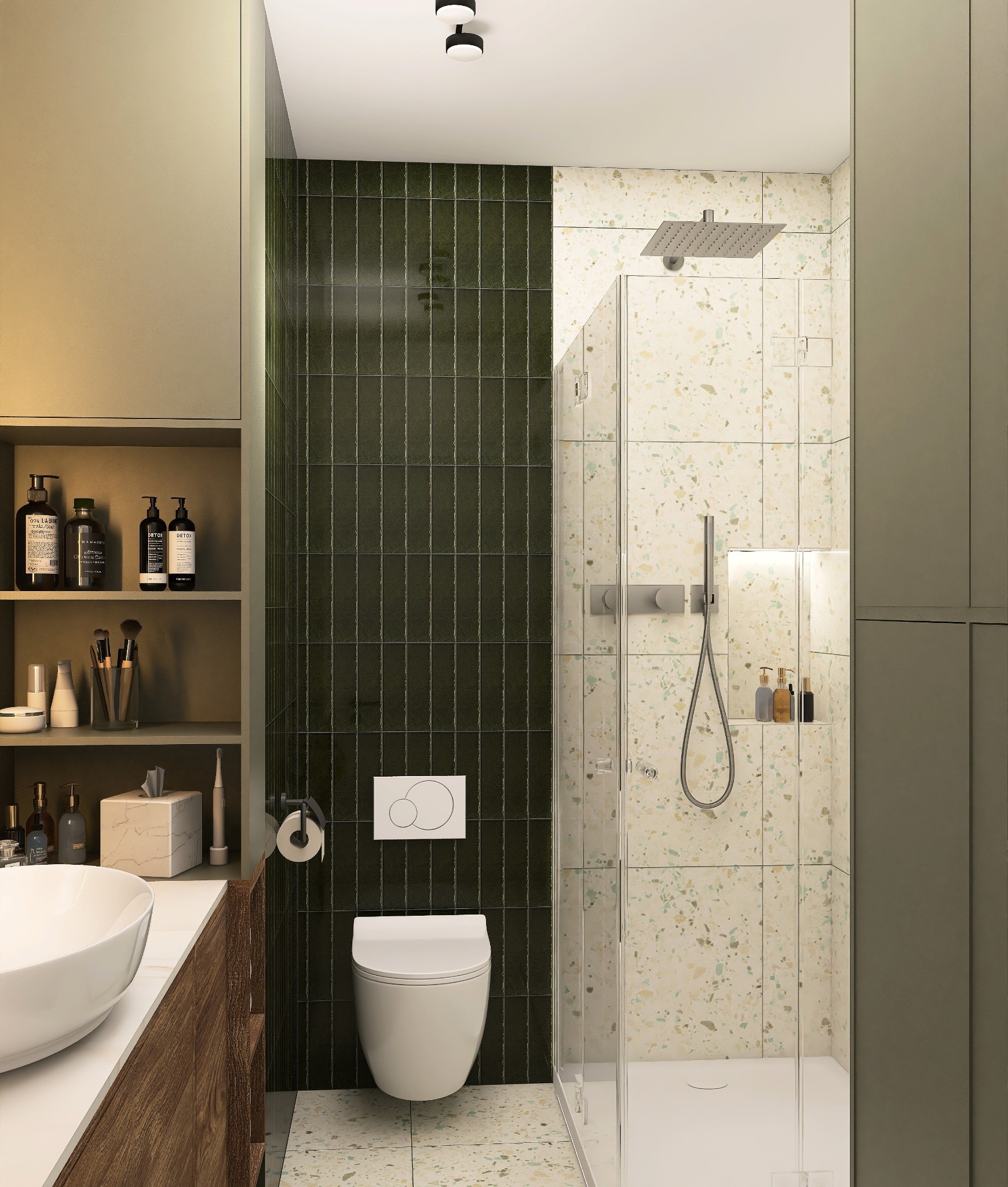 Nowoczesna łazienka z kabiną prysznicową, umywalką nablatową i WC. Ciemnozielone płytki kontrastują z terazzo. Oświetlenie punktowe i minimalistyczne dodatki.