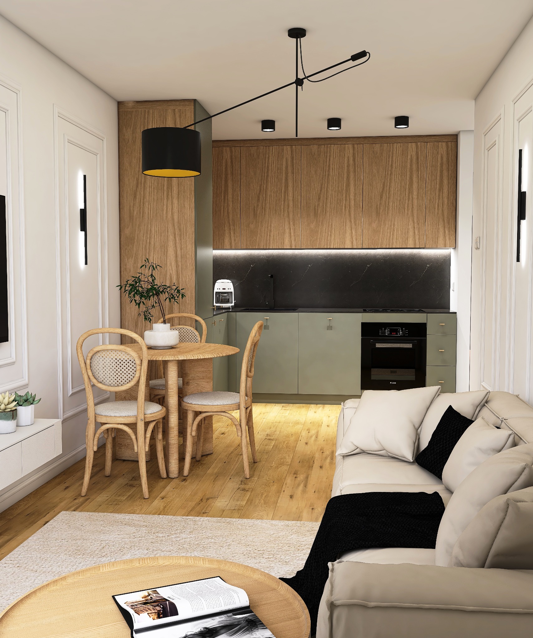 Wnętrze salonu z aneksem kuchennym w stylu nowoczesnym: drewniane fronty szafek, okrągły stół z rattanowymi krzesłami, sofa z poduszkami i czarnym pledem.