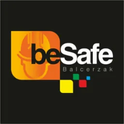 Logo firmy 'beSafe Balcerzak' z motywem kasku ochronnego w odcieniach pomarańczy i żółci.
