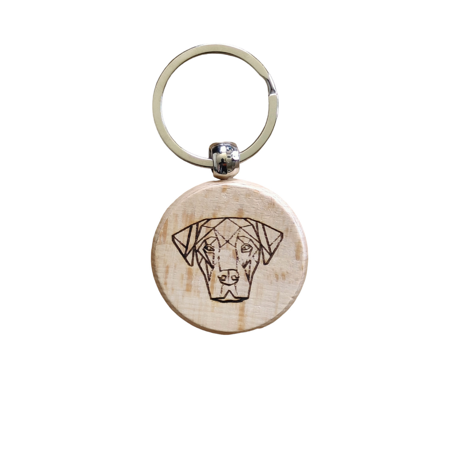 Drewniany brelok z geometrycznym wizerunkiem psa, wykonany techniką wypalania laserowego.