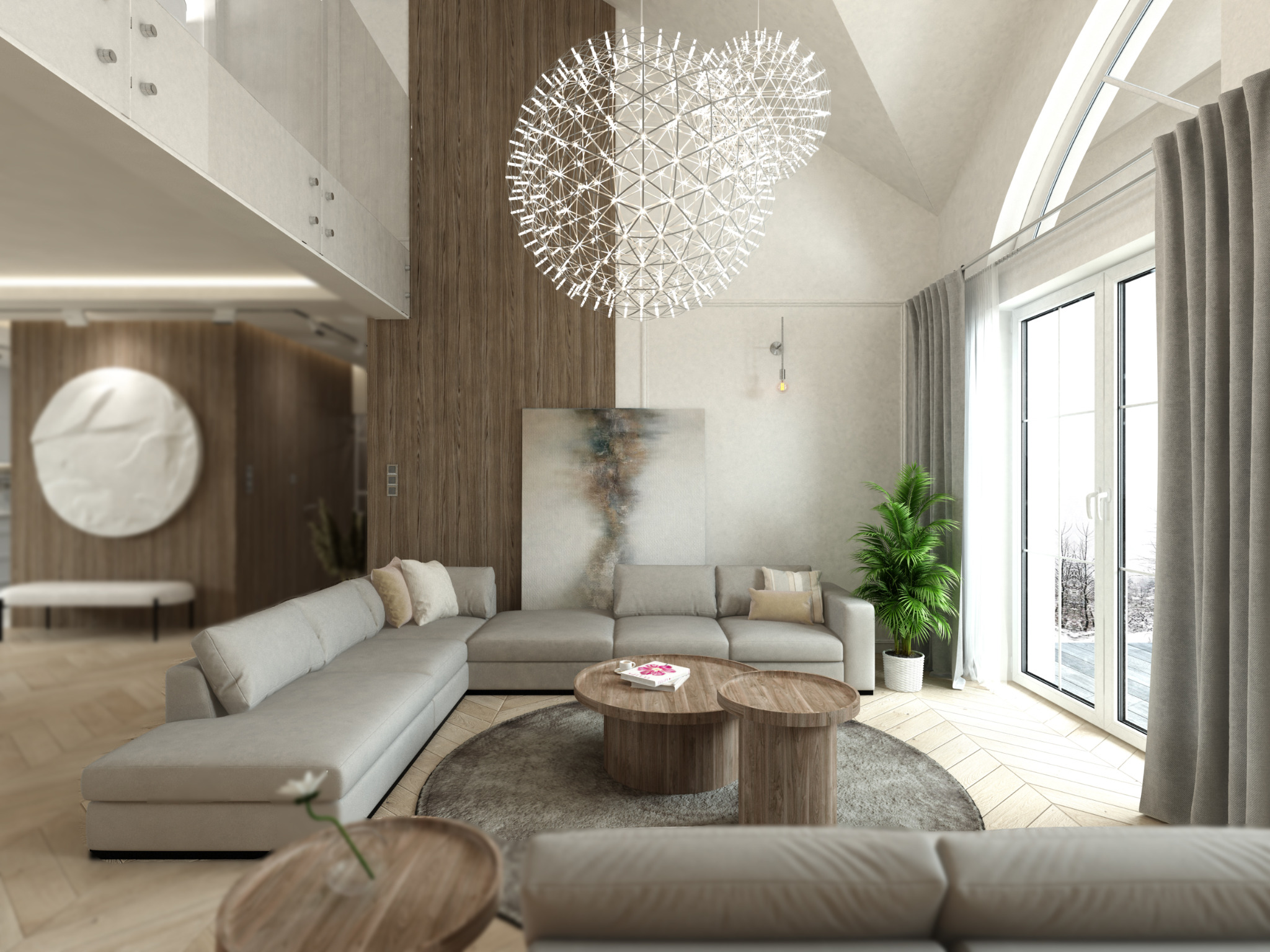 Jasne, przestronne wnętrze salonu z szarą sofą narożną, okrągłymi stolikami kawowymi z drewna, abstrakcyjnym obrazem na ścianie, dekoracyjną lampą sufitową i rośliną doniczkową przy oknie.