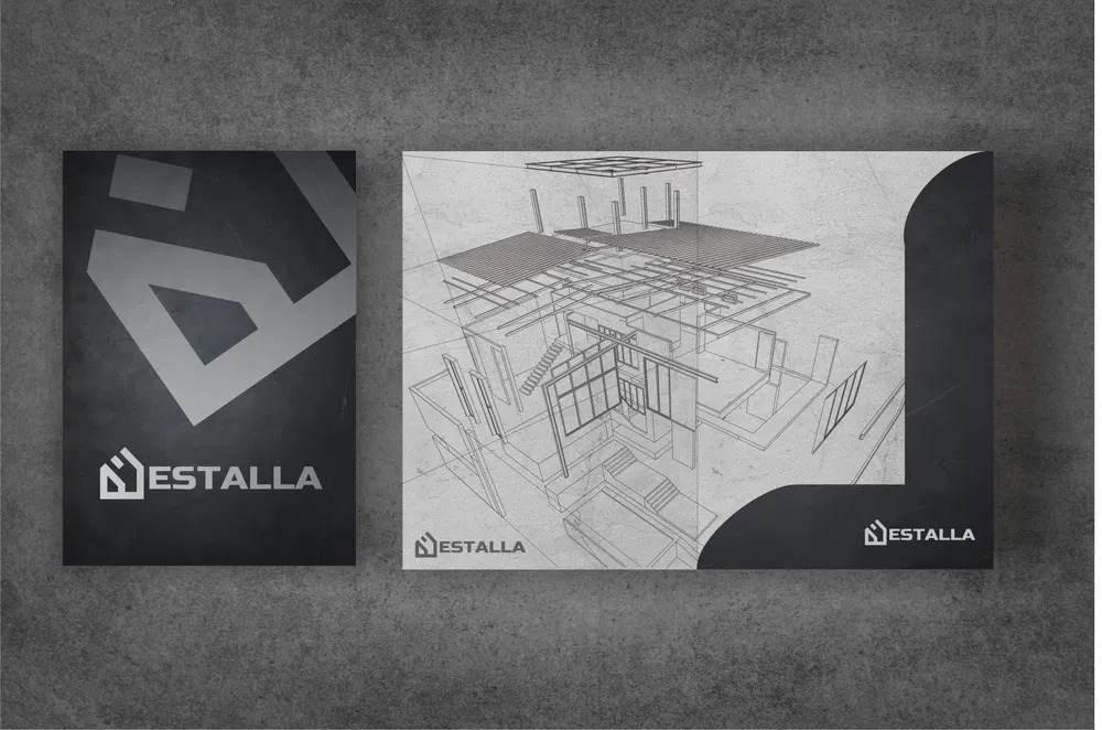 Dwa plakaty z logo i schematem przestrzennym budynku firmy Estalla na tle szarej ściany.