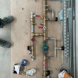 Siltums - Węzeł centrali wentylacyjnej z wbudowaną nagrzewnicą w instalacji CO hali produkcyjnej