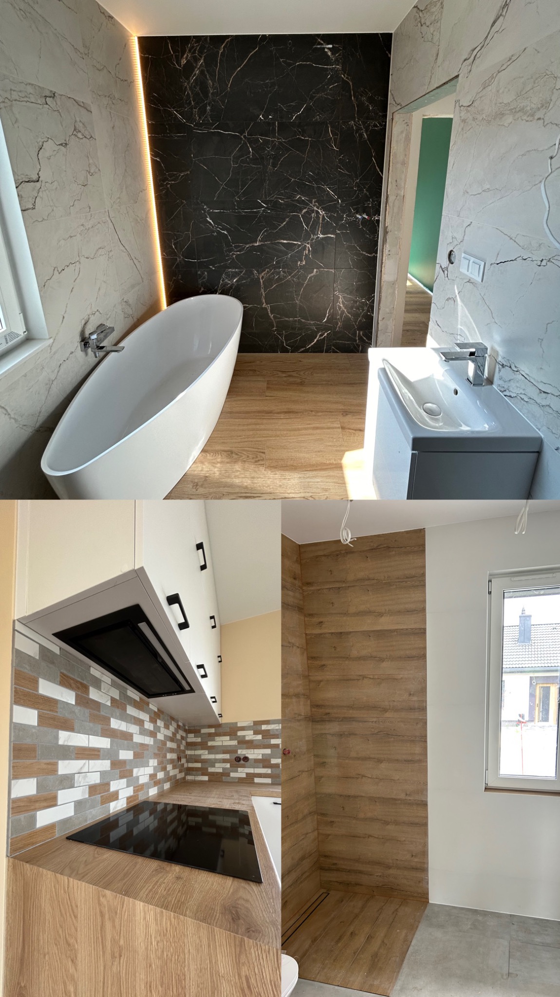 Wnętrze łazienki z wolnostojącą wanną, umywalką nablatową i czarną ścianą z marmurowym wzorem, połączone z fragmentem kuchni z płytą indukcyjną i drewnopodobnymi frontami oraz kabiną prysznicową...