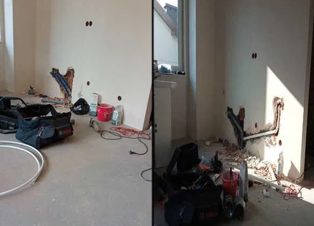 Wnętrze w trakcie remontu: odkryte rury w ścianie, narzędzia i materiały budowlane rozłożone na podłodze, widoczne ślady po wierceniu.