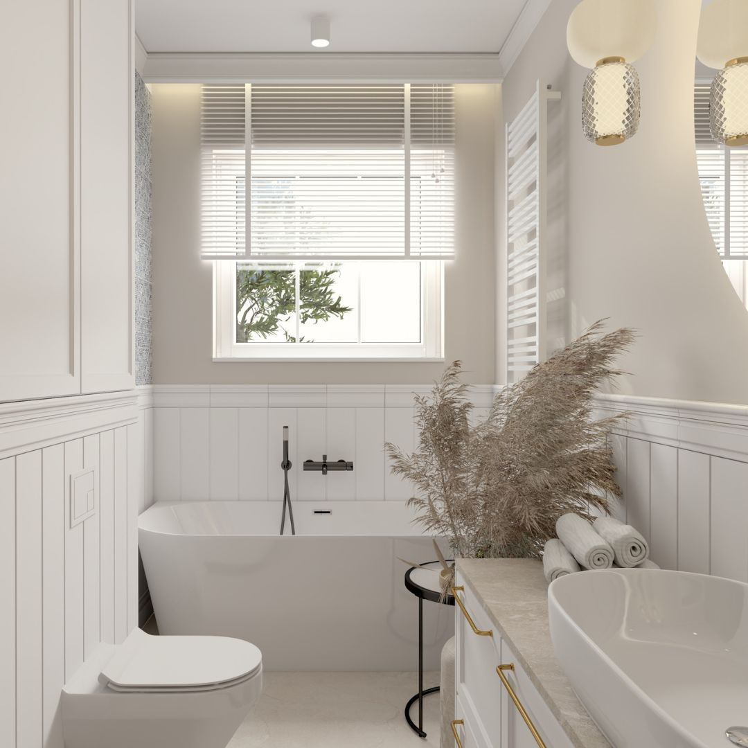 Jasna łazienka w stylu minimalistycznym z wanną wolnostojącą, umywalką nablatową i dekoracyjną trawą pampasową w czarnym stoliku pomocniczym.
