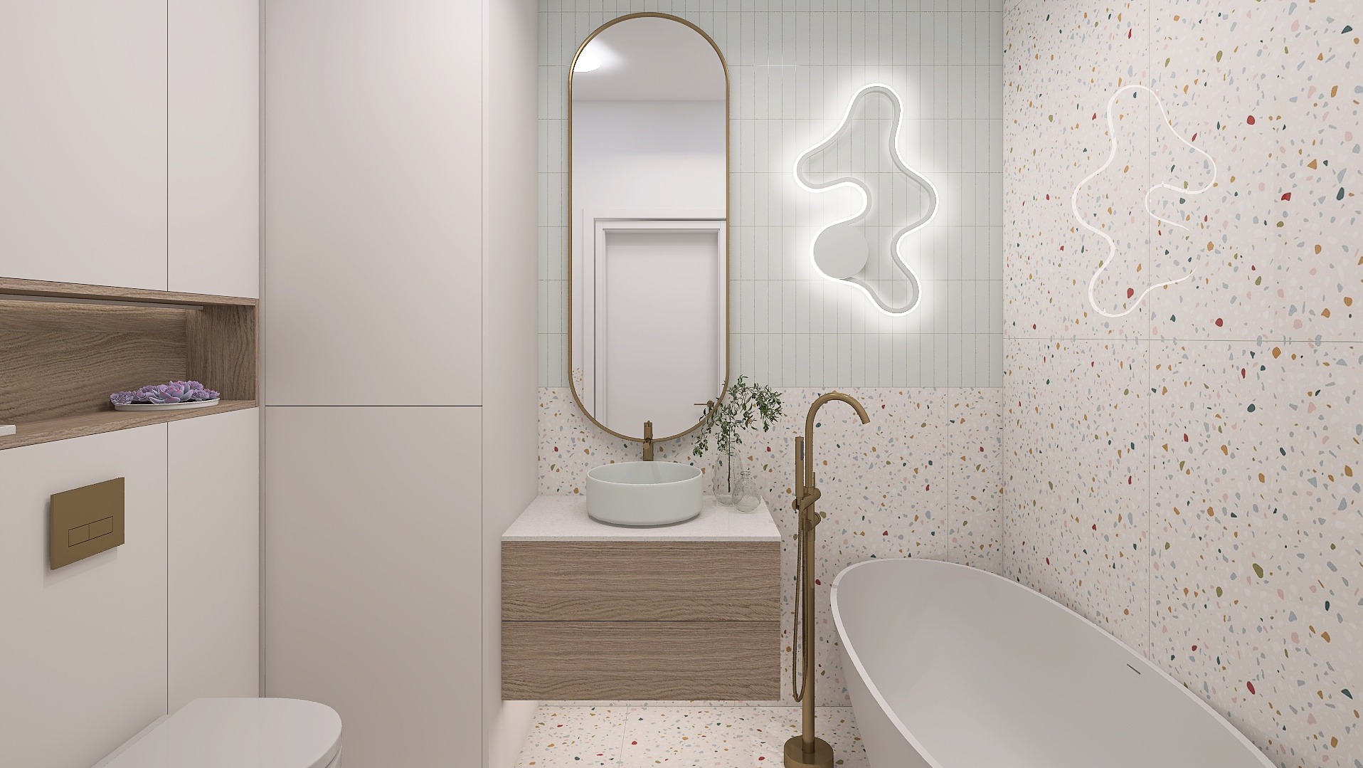 Nowoczesna łazienka z umywalką nablatową, lustrem w złotej ramie i wanną wolnostojącą na tle mozaiki lastryko. Minimalistyczny design z akcentami złota.